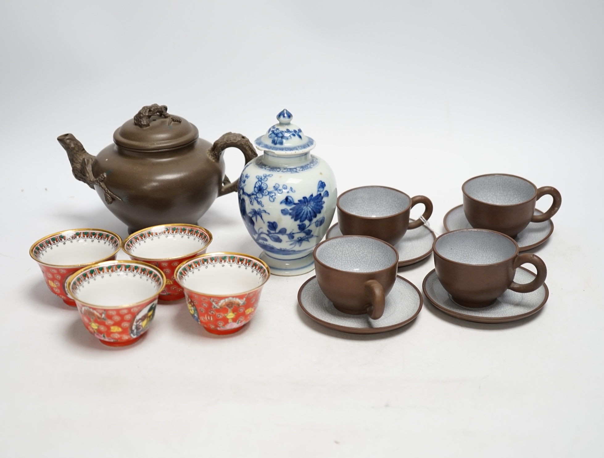A Chinese blue and white tea caddy, four tea bowls, four cups and saucers and a teapot, largest 17cm high